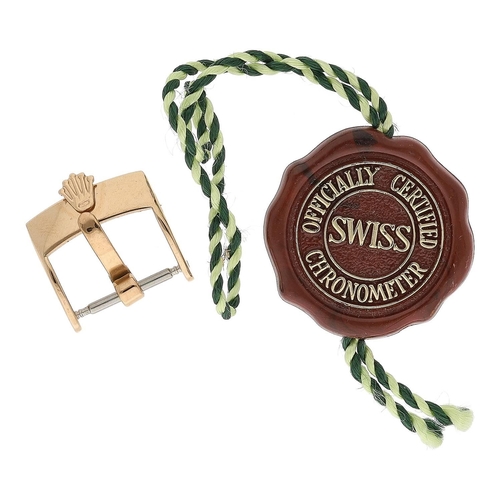 446 - Rolex red swing tag; together with a gold plated Rolex wristwatch strap buckle (2)