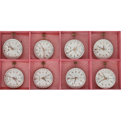 476 - Eight Jura Watch Co. calendar wristwatch movements (8)