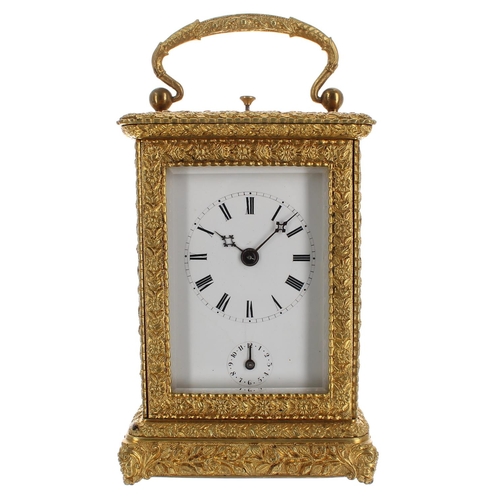 1241 - Ornate repeater carriage clock with alarm and striking on a bell, within a decorative case cast with... 