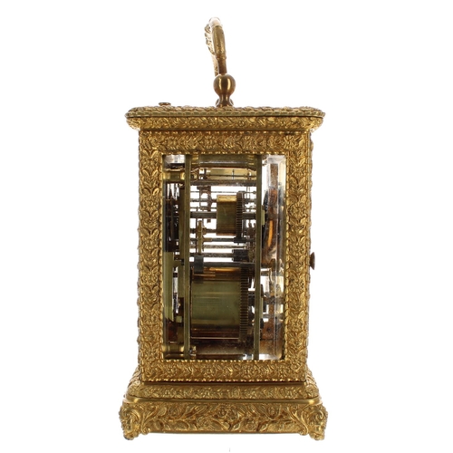 1241 - Ornate repeater carriage clock with alarm and striking on a bell, within a decorative case cast with... 