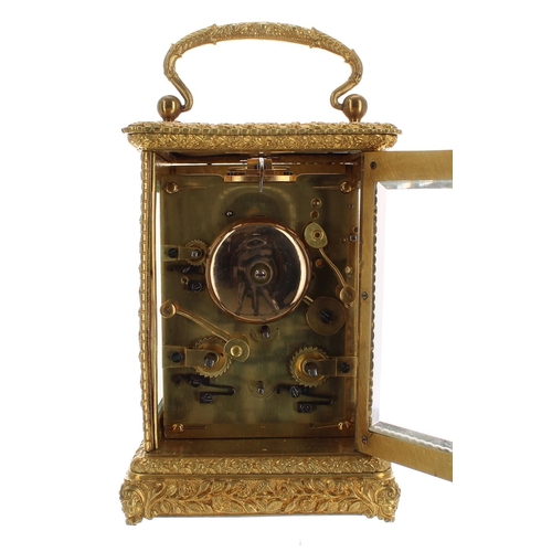 1241 - Ornate repeater carriage clock with alarm and striking on a bell, within a decorative case cast with... 