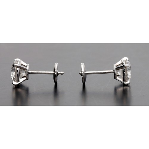 114 - Cartier - fine pair of GIA certified diamond stud earrings, round brilliant-cuts, both clarity VVS2,... 