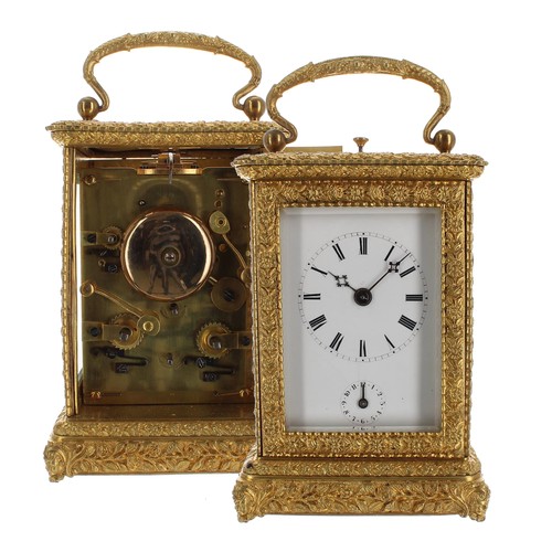 1241 - Ornate repeater carriage clock with alarm and striking on a bell, within a decorative case cast with... 