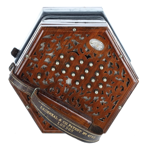 2513 - Lachenal & Co McCann duet concertina, with thirty-nine metal keys on pierced rosewood ends, six-... 