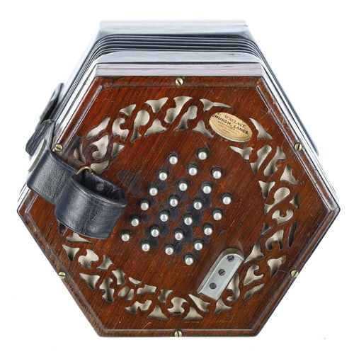 2517 - C. Wheatstone & Co English concertina, with forty-eight metal buttons on pierced rosewood ends, ... 