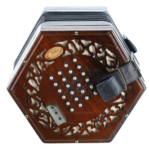 2517 - C. Wheatstone & Co English concertina, with forty-eight metal buttons on pierced rosewood ends, ... 