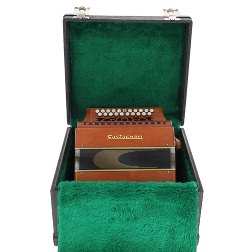 2530 - Good Castagnari four voice melodeon tuned in D/G, with handmade reeds, within the original plush lin... 