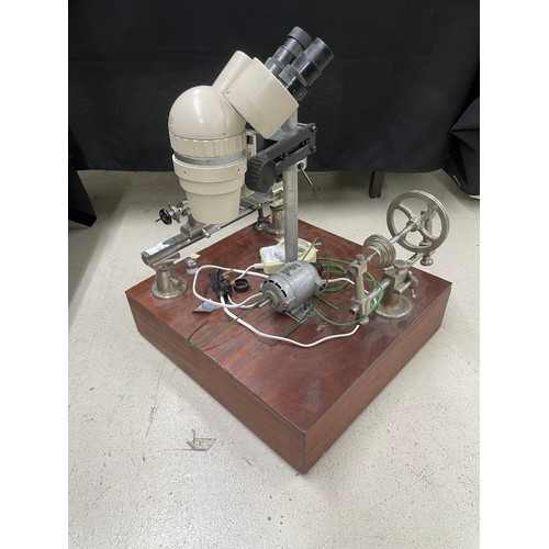 986 - Ime watchmakers lathe; together with an Olympus SZ microscope, mounted to a bespoke wooden base; als... 