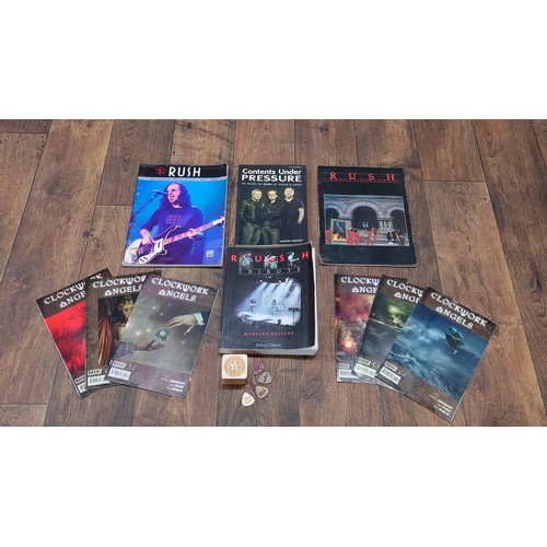 444 - Rush - Selection of Rush related items to include Neil Peart and Kevin Anderson's comic 'Clockwork A... 