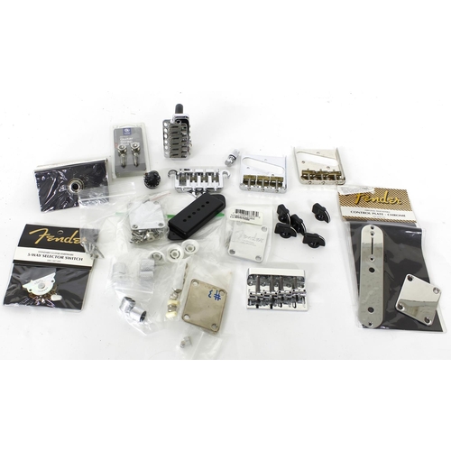 1117 - Mixed selection of Fender, Wilkinson and other guitar hardware, to include bridges, bridge plates, n... 