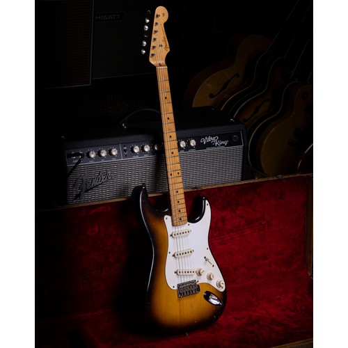 382 - 1957 Fender Stratocaster electric guitar, made in USA; Body: Two-tone sunburst finished alder, large... 