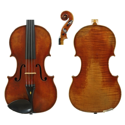 French violin by and labelled Jean Baptiste Vuillaume á Paris, Rue Croix des Petits Champs, the one piece back of faint medium irregular curl with similar wood to the sides and head, the table of a medium width grain and the varnish of a light reddish-brown colour on a golden ground, 14", 35.60cm