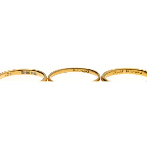 273 - Three 22ct wedding band rings, each with clear British hallmarks, 7.8gm in total (3)... 
