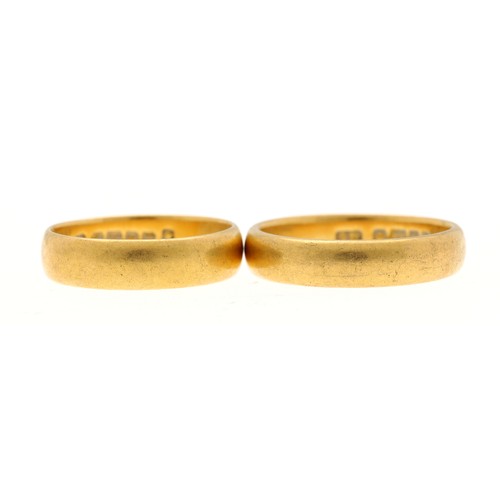 265 - Two 22ct wedding band rings, each with clear British hallmarks for Birmingham 1923 and 1924, 9gm in ... 