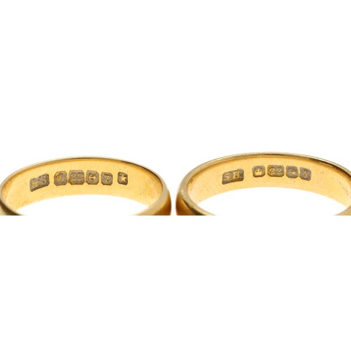 265 - Two 22ct wedding band rings, each with clear British hallmarks for Birmingham 1923 and 1924, 9gm in ... 