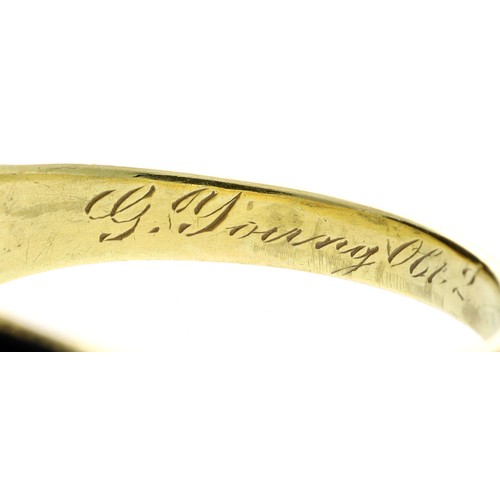 241 - Victorian yellow gold and black enamel mourning ring, set with three old-cut diamonds, with an inner... 