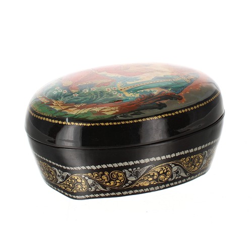 Russian Palekh type lacquered oval box, the cover depicting a royal ...