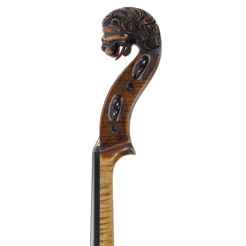 155 - 19th century Bavarian violoncello with carved lion's head scroll, unlabelled, the two piece back of ... 