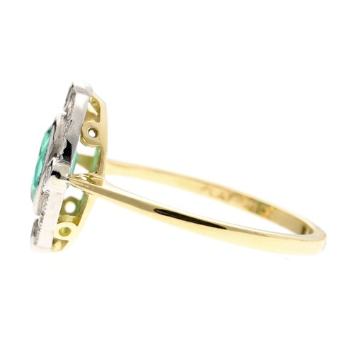 310 - Attractive 18ct and platinum emerald and diamond halo cluster ring, the emerald 0.75ct approx, in a ... 