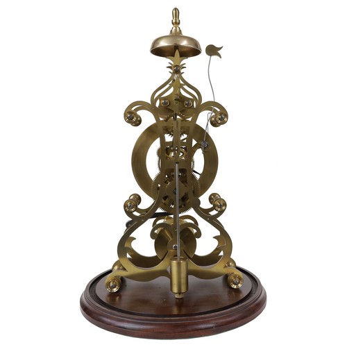1503 - Brass single fusee skeleton clock with passing strike on a bell, the 5.5