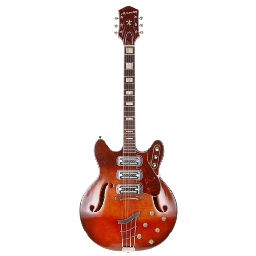 131 - 1963 Harmony H-77 hollow body thinline electric guitar, made in USA; Body: red burst finish maple, l... 