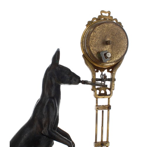 1316 - Rare novelty mystery clock in the form of a kangaroo with timepiece pendulum, upon a rectangular ste... 