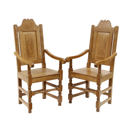 878 - Alan Sully of Marlborogh - a pair of oak panel backed carver chairs, 20
