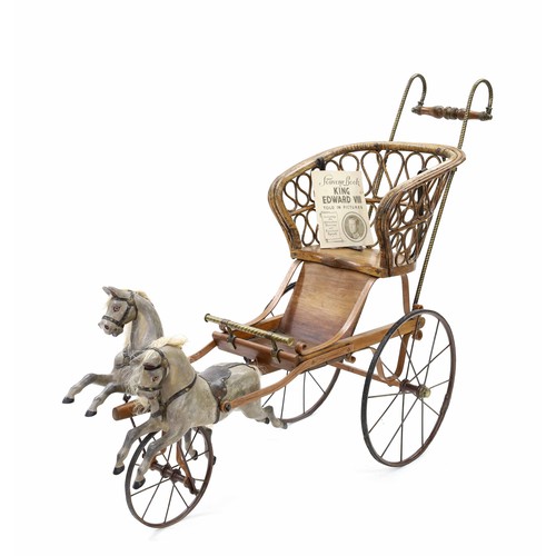 Fine pair horse galloping gig, early 20th century, having dappled grey horses, a bent cane seat and barley twist brass and turned wooden handle, 57" long