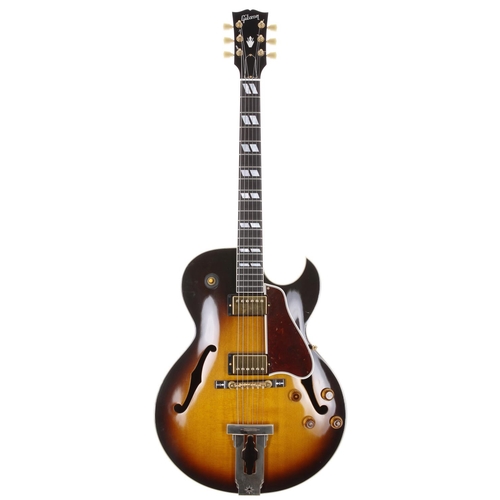 2005 Gibson Custom Shop L-4 CES Master Model hollow body electric guitar, made in USA; Body: sunburst finished spruce top upon mahogany back and sides; Neck: mahogany; Fretboard: ebony; Frets: good; Electrics: working; Hardware: generally good, typical loss to gold plating on tailpiece; Case: original hard case; Weight: 3.24kg; Overall condition: very good