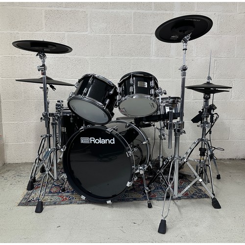 Roland V-Drums Acoustic Design electronic drum kit, comprising TD-27 drum sound module, KD-200 kick drum, PD-140DS digital snare drum, Mesh Head floor tom and two Mesh Head rack toms, VH-14D digital pad hi-hat upon Pearl stand, CY-18DR digital ride pad, CY-14C-T digital crash pad, CY-16R-T digital crash pad, with associated hardware and sticks