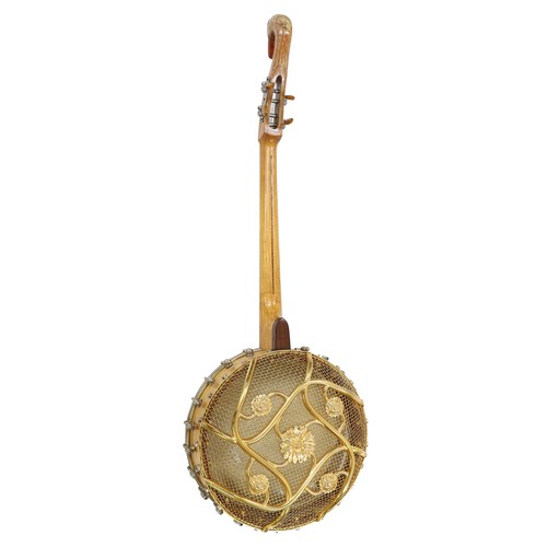 2505 - Unusual and possibly unique four string banjo stamped Georges Carcassonne, Paris on the heel, the pi... 