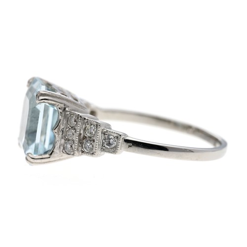 132 - Impressive modern platinum aquamarine and diamond dress ring, the aquamarine 4.00ct approx, in a sty... 