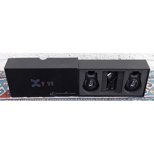 1543 - Xvive U2 wireless guitar system, boxed