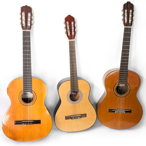 2104 - Cuenca Model 40 classical guitar, with hard case; together with an Aria A549 classical guitar and a ... 