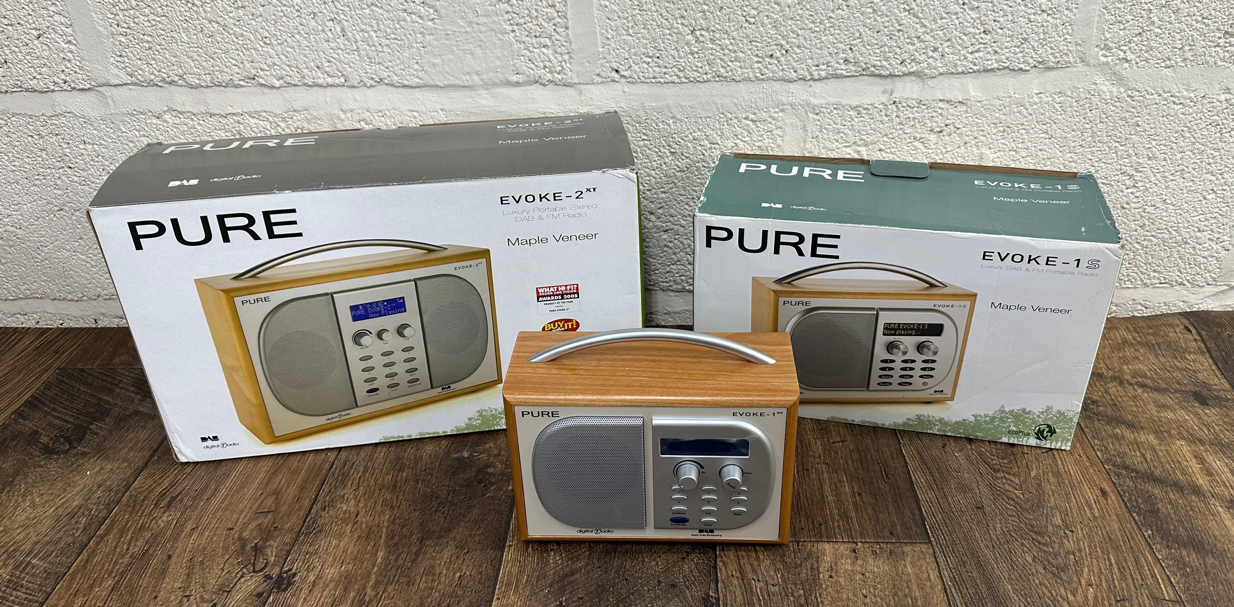 Pure Evoke-1S DAB radio; together with a Pure Evoke-2XT DAB radio and a ...