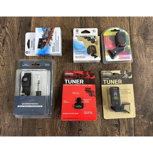 1509 - Selection of clip-on tuners to include a Peterson TP-3 clip-on tuning pickup, a D'Addario NS micro t... 