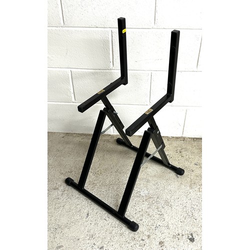 1536 - Two RockStand seven position folding guitar rack stands; together with an amplifier stand... 