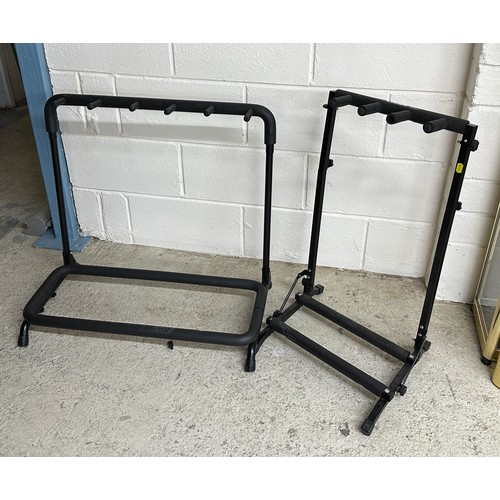 1503 - Two folding guitar rack stands including a Gorilla three-position stand and another five-position st... 