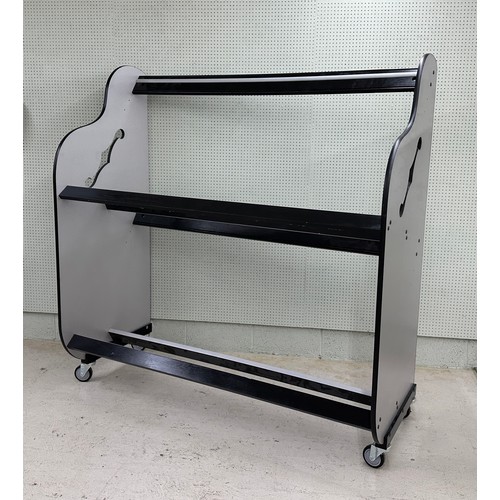 1516 - Large two tier guitar case shelving rack on wheels