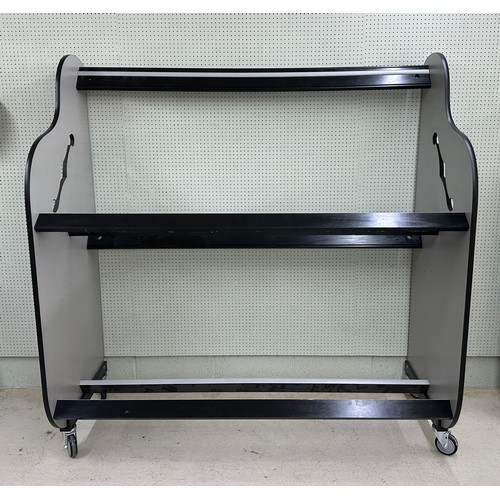 1516 - Large two tier guitar case shelving rack on wheels