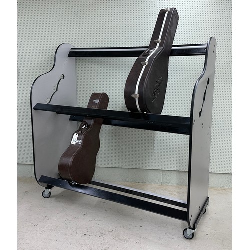 1516 - Large two tier guitar case shelving rack on wheels