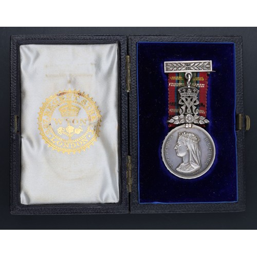Victorian Faithfull Service Medal awarded to Christian Doll Esq, the reverse engraved 'To Christian Doll Esq. Pace of the presence for faithful services during 41 years to the Queen and her predecessor King William IV 1875', complete with original suspension and tartan ribbon, in a Wyon, Regent Street, London case of issue