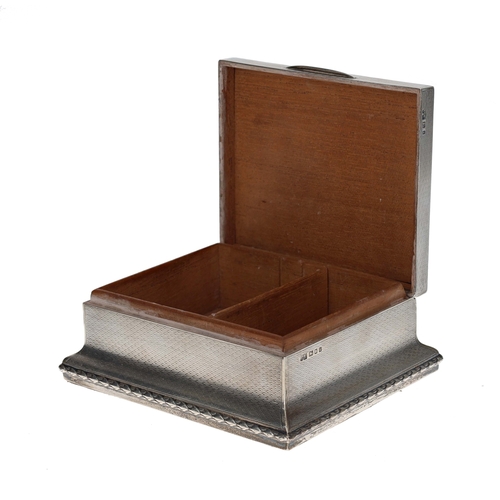 403 - Mappin & Webb silver cigarette/trinket box, the engine turned hinged cover with rectangular plai... 