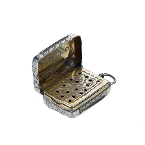 437 - Victorian silver vinaigrette, the scroll and heart cartouche engraved cover enclosing a gilt scroll ... 