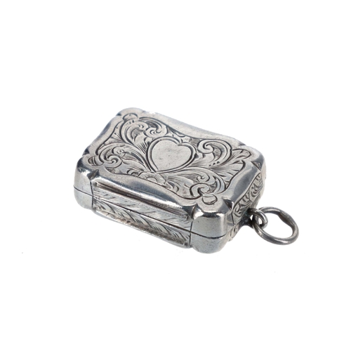 437 - Victorian silver vinaigrette, the scroll and heart cartouche engraved cover enclosing a gilt scroll ... 