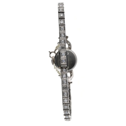 15 - Fine Vertex Revue platinum diamond set lady's cocktail wristwatch, case reference 334/1384 set with ... 