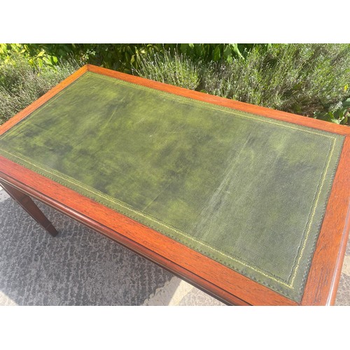 840 - Mahogany library writing table, 20th century, the moulded top with inset tooled leather writing sirf... 