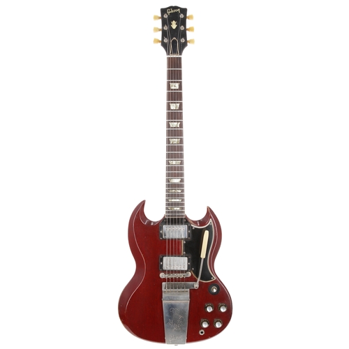 1963 Gibson SG Standard electric guitar, made in USA; Body: cherry finished mahogany, finish rubbing/loss to edges, various dings and other marks otherwise generally good for age; Neck: wear throughout and a few minor dings, Frank Hessy retail sticker to back of head; Fretboard: Brazilian rosewood, groove wear; Frets: heavy wear; Electrics: working, Patent Applied For (PAF) pickup to neck position, Patent number pickup to bridge position, potentiometers dating to 1963; Hardware: replacement switch tip, slight bend to lower E tuner shaft, one replacement tuner screw, minor tarnishing otherwise good; Case: original Frank Hessy supplied hard case enclosing original Gibson strap; Weight: 3.35kg; Overall condition: good