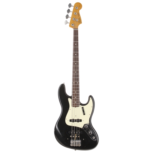 182 - 1980s Fender Jazz Bass '62 Stack Knob Reissue bass guitar, made in USA; Body: black refinish, wear t... 
