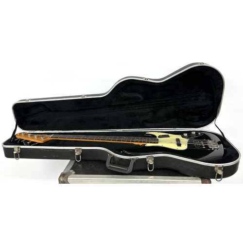 182 - 1980s Fender Jazz Bass '62 Stack Knob Reissue bass guitar, made in USA; Body: black refinish, wear t... 